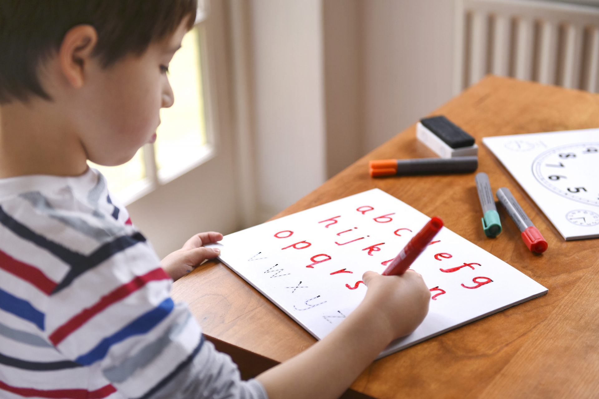 Caractères d'imprimerie vs écriture cursive 