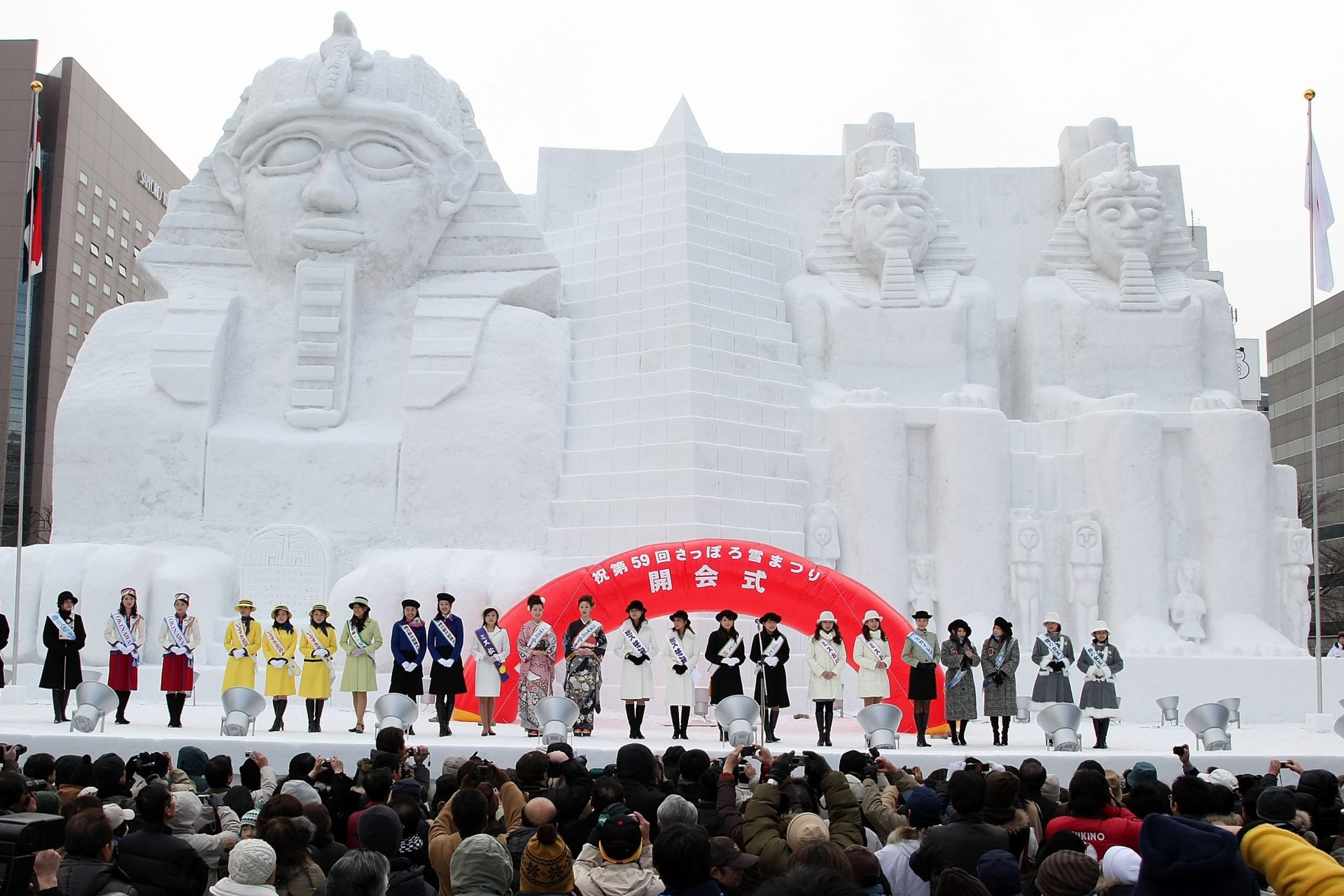 Miss Japan contestants gather in front of the pyramid