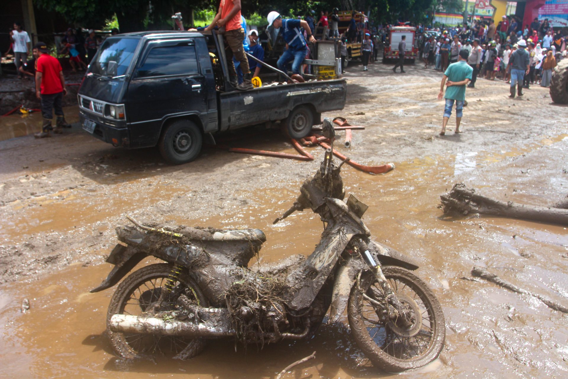 Roads and villages covered in sludge