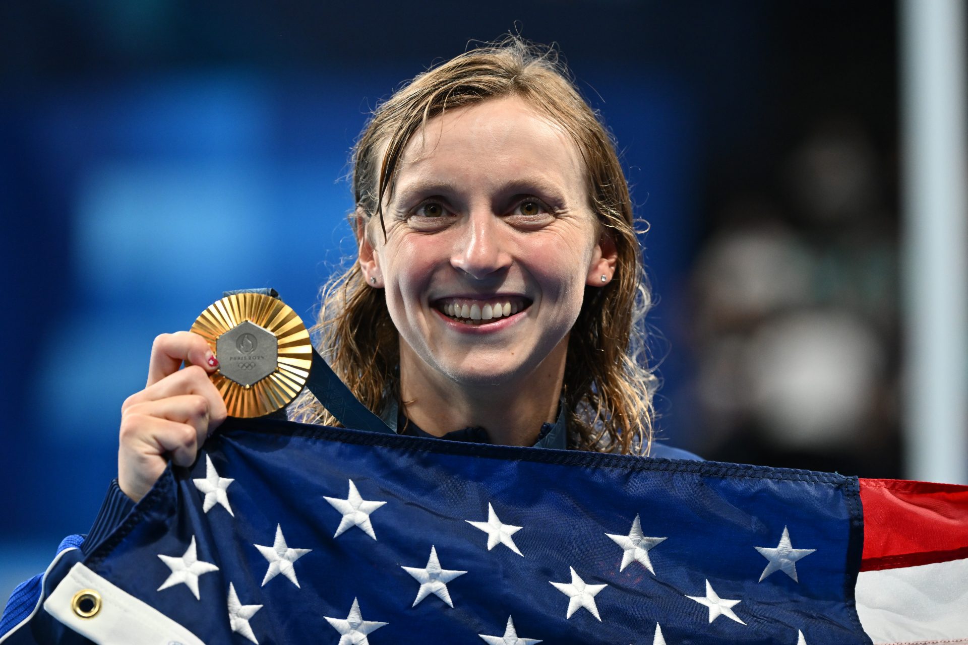 Where does Katie Ledecky rank amongst the greatest USA swimmers of all-time?