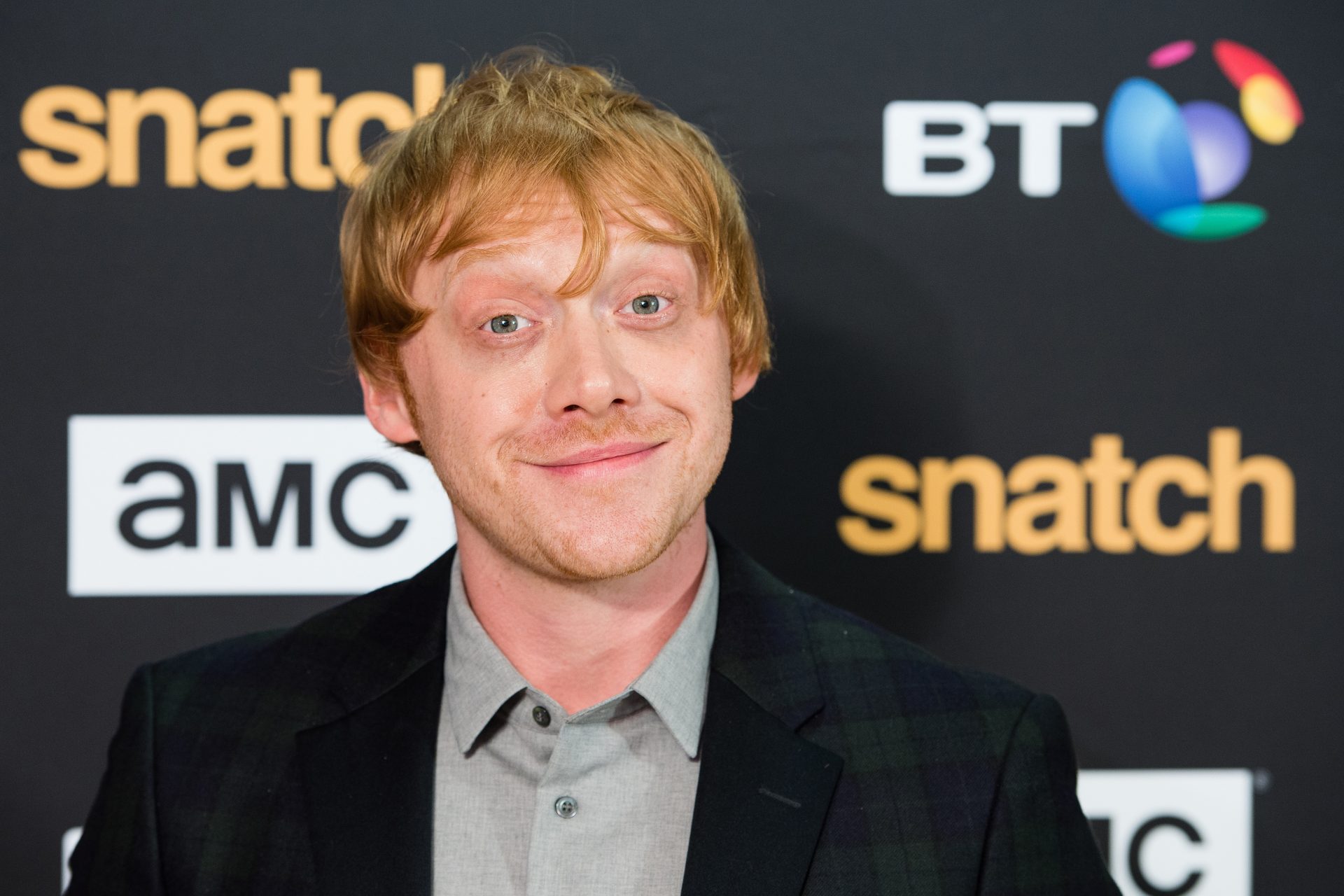 Rupert Grint como Ron Weasley