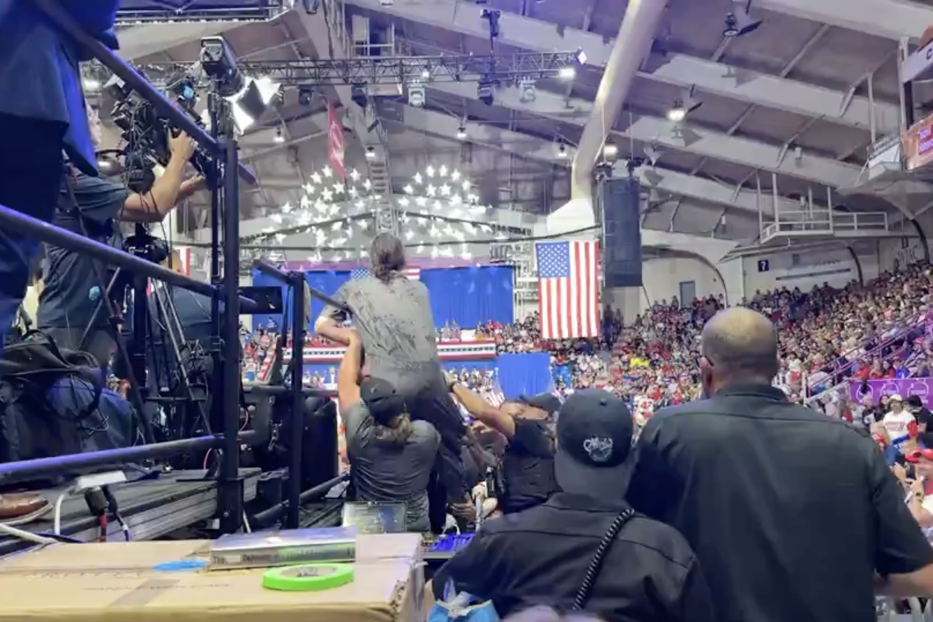 A protestor tried to storm the press section 