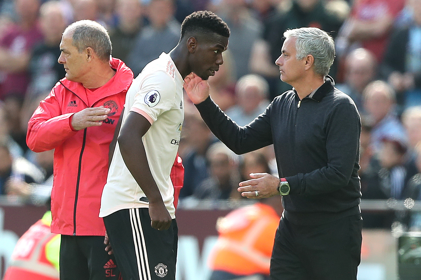 Paul Pogba y Jose Mourinho 